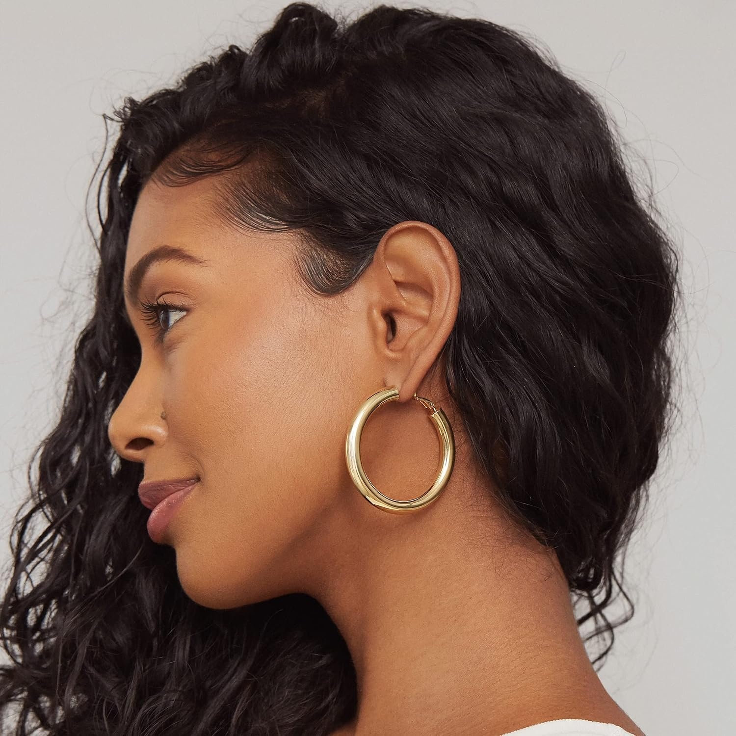 image:imagePAVOI 14K Gold Plated 925 Sterling Silver Post Hoops Lightweight Chunky Hoops Huggies Thick Gold Hoop Earrings for Women500 Millimeters