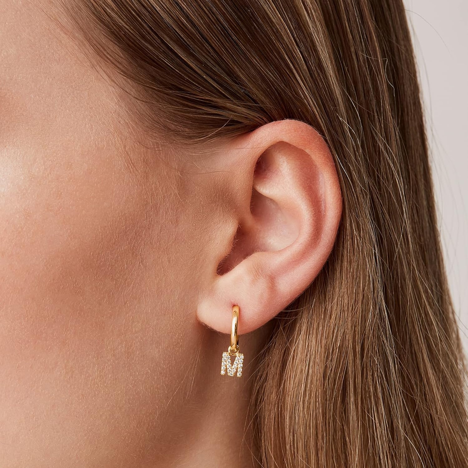 image:imagePAVOI 14K Gold Plated 925 Sterling Silver Post Huggie Earring with Initial Dangle CZ Huggie Hoop Earrings Womens Cubic Zirconia Initial HuggiesYellow Gold
