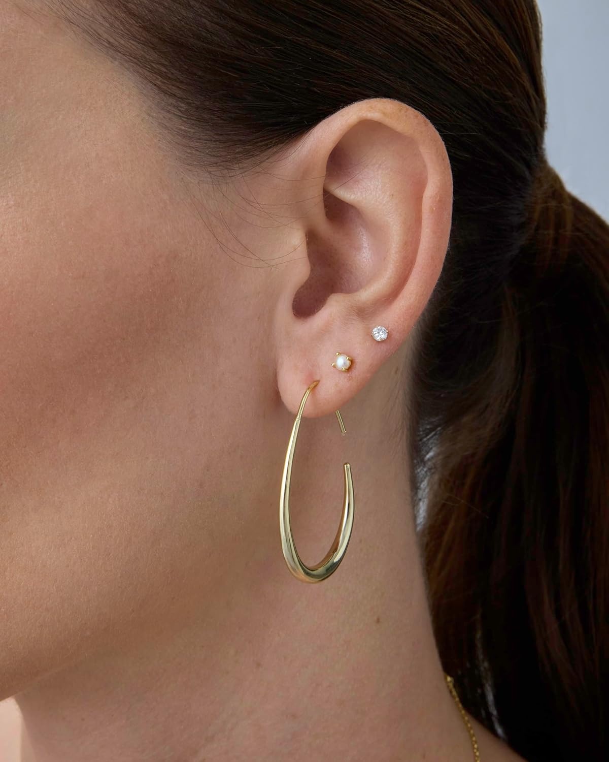 image:imagePAVOI 14K Gold Plated 925 Sterling Silver Post Lightweight Teardrop Hoop Earrings for Women Large Oval PullThrough Statement EarringsWhite Gold