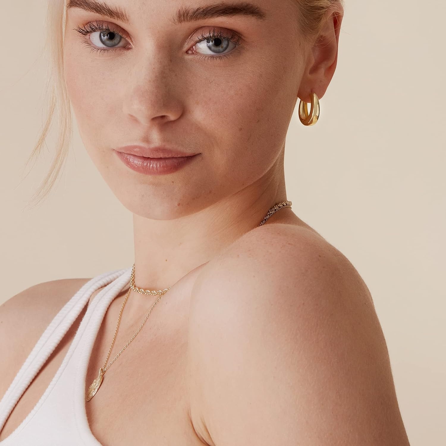 image:imagePAVOI 14K Gold Plated 925 Sterling Silver Post Small Chunky Hoops Earrings Thick Lightweight Gold Hoop Earrings for WomenWhite Gold