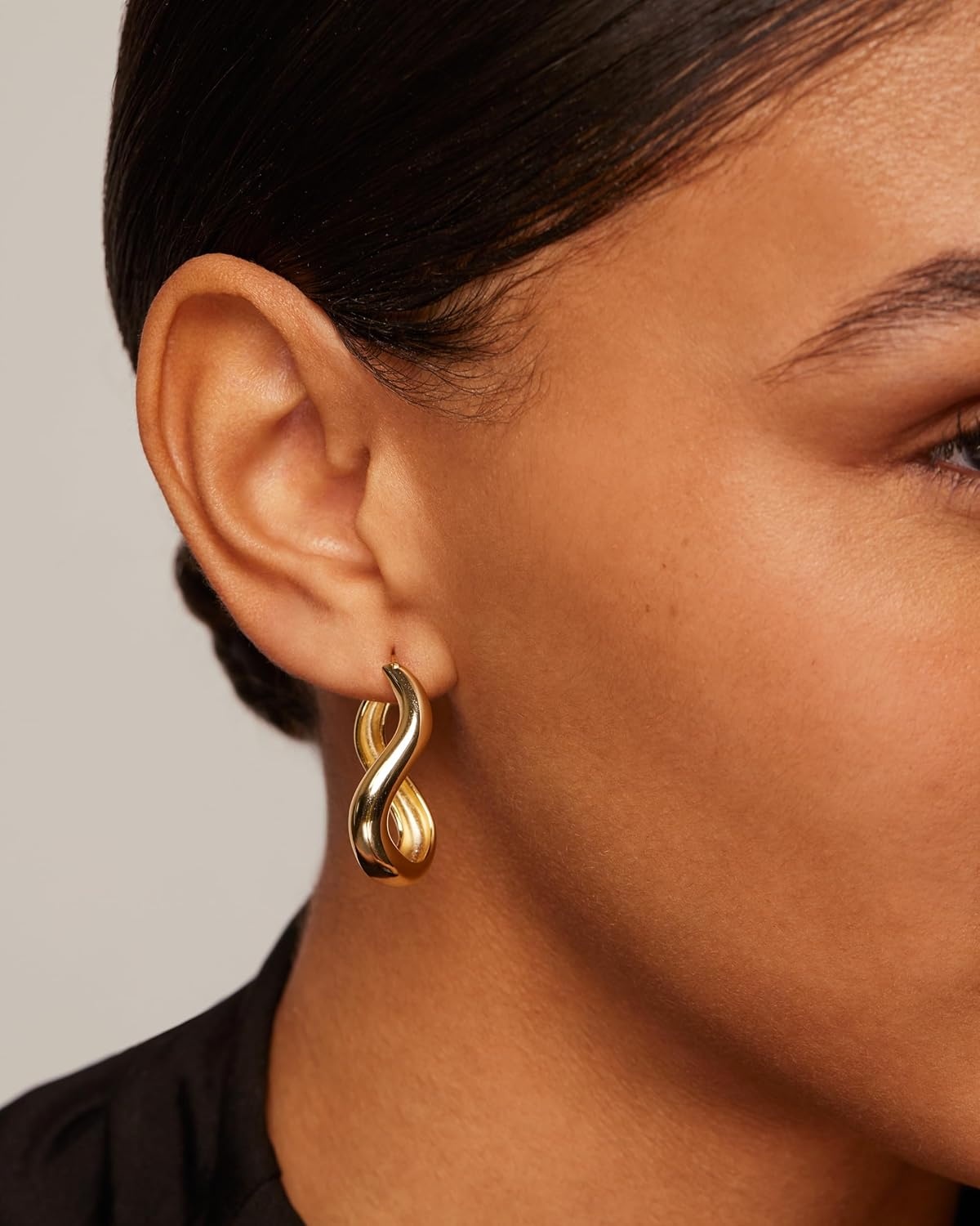 image:imagePAVOI 14K Gold Plated 925 Sterling Silver Posts Chunky Wavy Hoop Earrings for Women Lightweight Statement Twisted Endless Wave Hoops EarringsYellow Gold