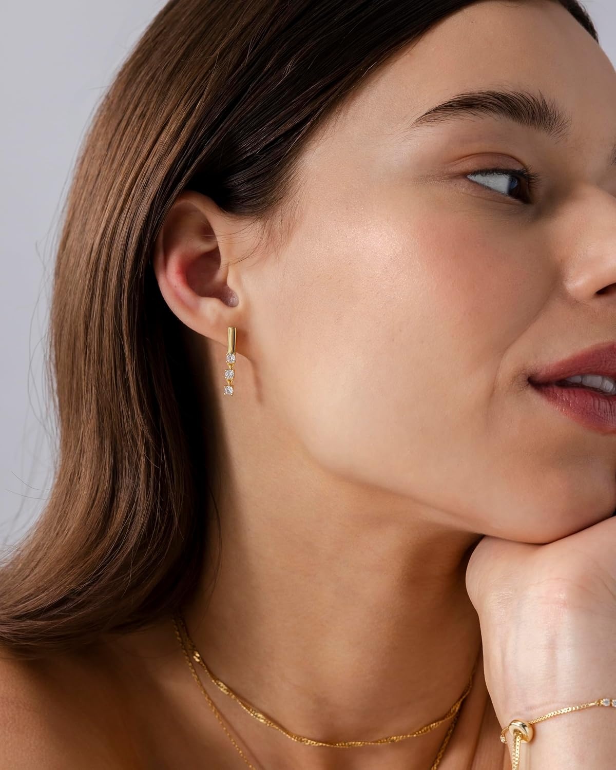 image:imagePAVOI 14K Gold Plated 925 Sterling Silver Posts Mini Bar Drop Dangle Flatback Earrings for Women Dainty Helix Cartilage Piercing Jewelry Baguette Bezel Marquise Pearl Cubic Zirconia Screwback Stud EarringsTriple Stone