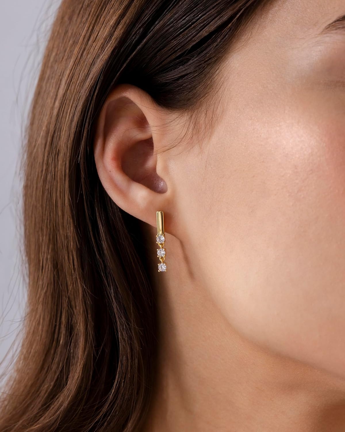 image:imagePAVOI 14K Gold Plated 925 Sterling Silver Posts Mini Bar Drop Dangle Flatback Earrings for Women Dainty Helix Cartilage Piercing Jewelry Baguette Bezel Marquise Pearl Cubic Zirconia Screwback Stud EarringsTriple Stone