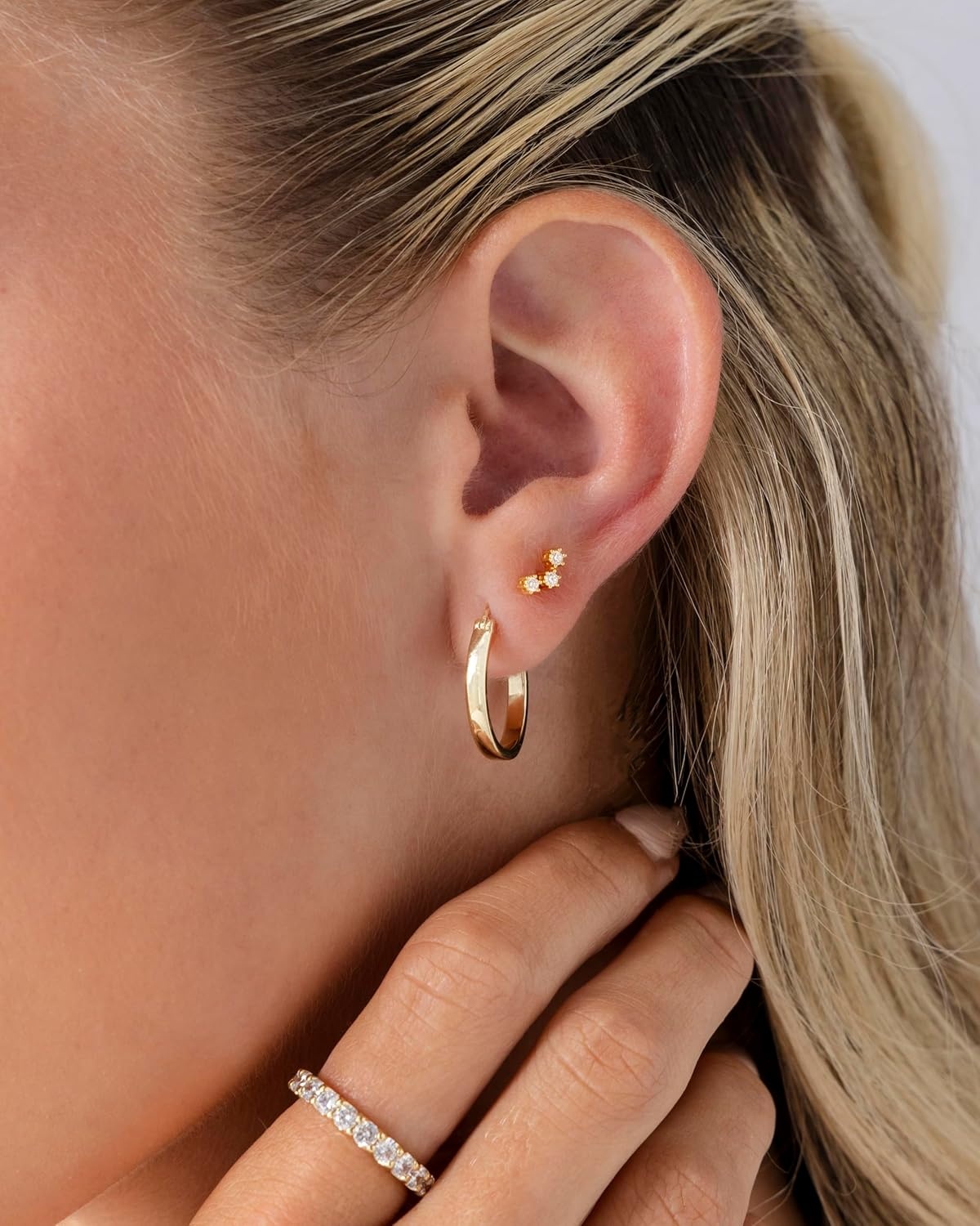 image:imagePAVOI 14K Gold Plated 925 Sterling Silver Posts Mini Stud Flat Back Earrings for Women Helix Cartilage Piercing Jewelry Dainty Pearl Star Cluster Cubic Zirconia Lotus Climber Screw BacksCZ Cluster