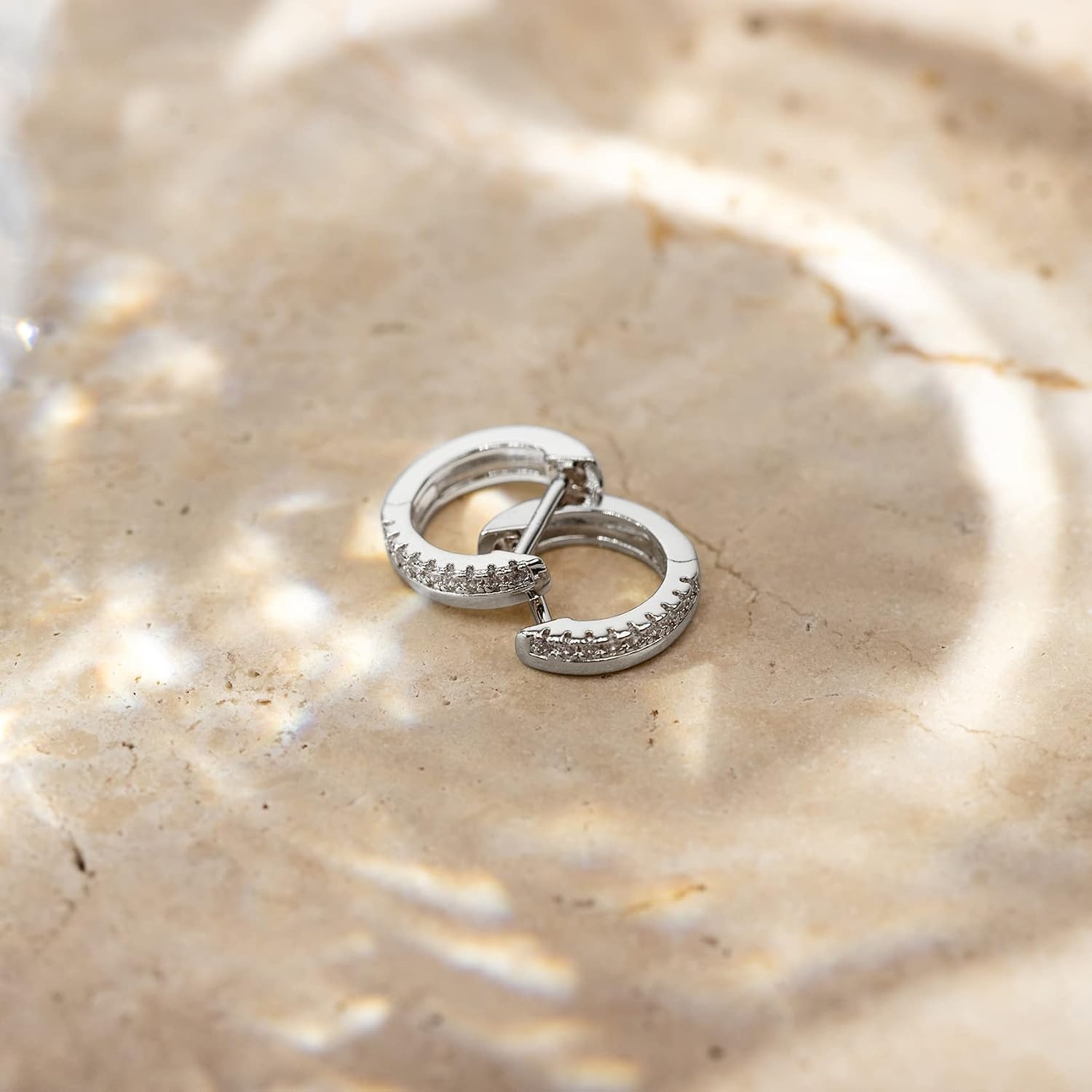 image:imagePAVOI 14K Gold Plated Cubic Zirconia Huggie Hoop Earrings for Women 925 Sterling Silver Posts Small Round Huggies Stud Earrings for WomenWhite Gold