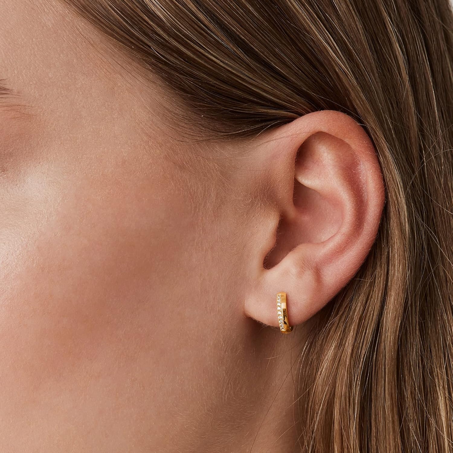 image:imagePAVOI 14K Gold Plated Cubic Zirconia Huggie Hoop Earrings for Women 925 Sterling Silver Posts Small Round Huggies Stud Earrings for WomenYellow Gold