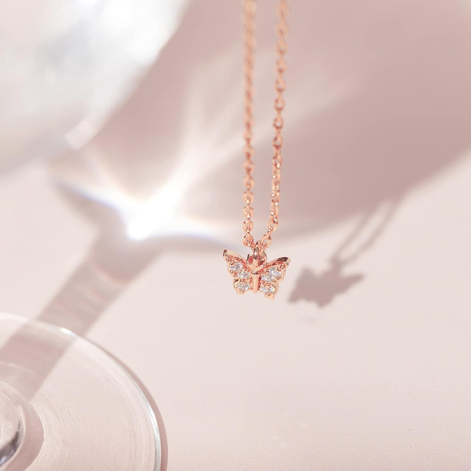 image:imagePAVOI 14K Gold Plated Dainty Cubic Zirconia Pendant Necklace for Women Dot Elephant Butterfly Pineapple Lock Knot Palm Tree Bow Smiley Pendant Layering Chain NecklacesRose Gold