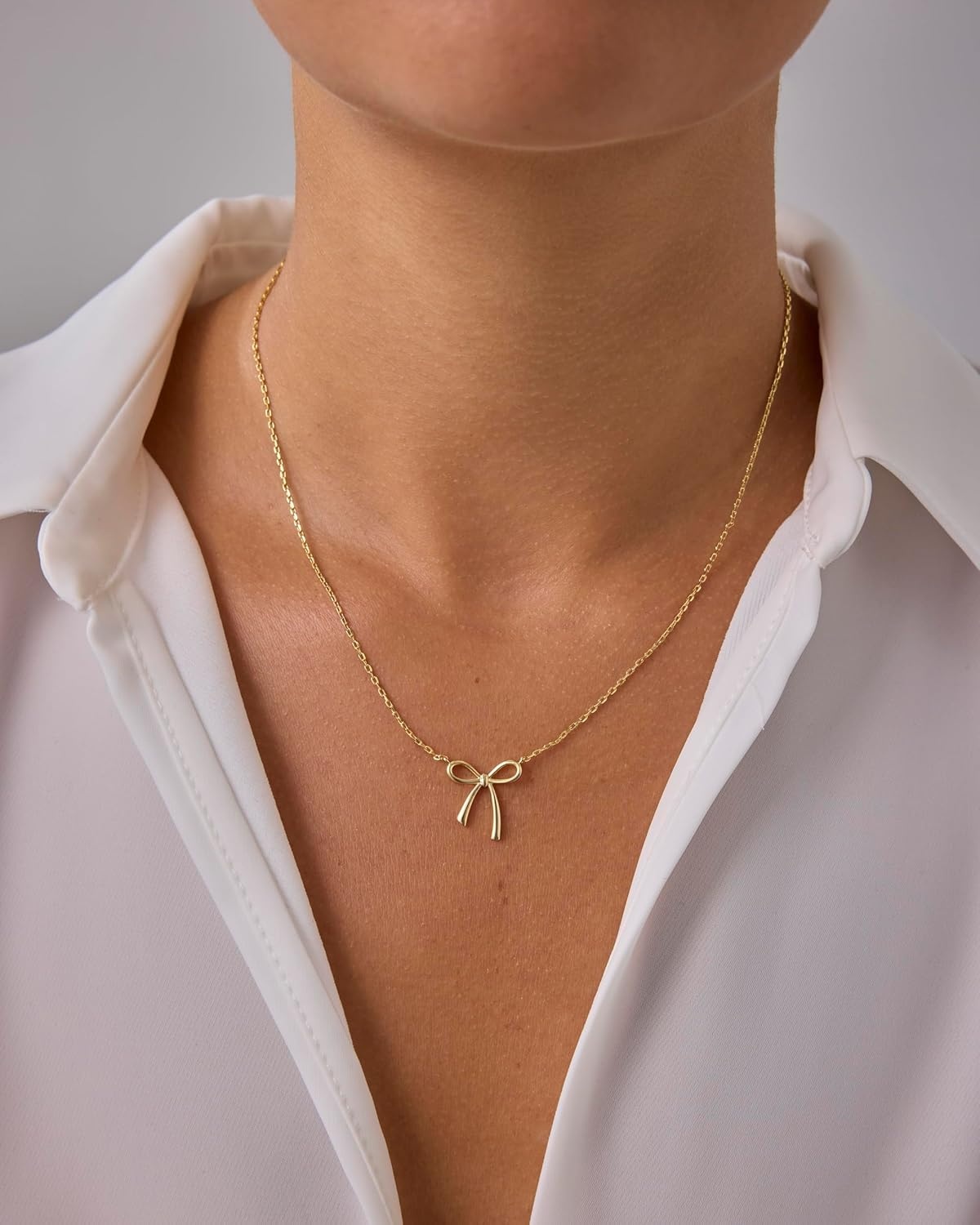 image:imagePAVOI 14K Gold Plated Dainty Cubic Zirconia Pendant Necklace for Women Dot Elephant Butterfly Pineapple Lock Knot Palm Tree Bow Smiley Pendant Layering Chain NecklacesYellow Gold