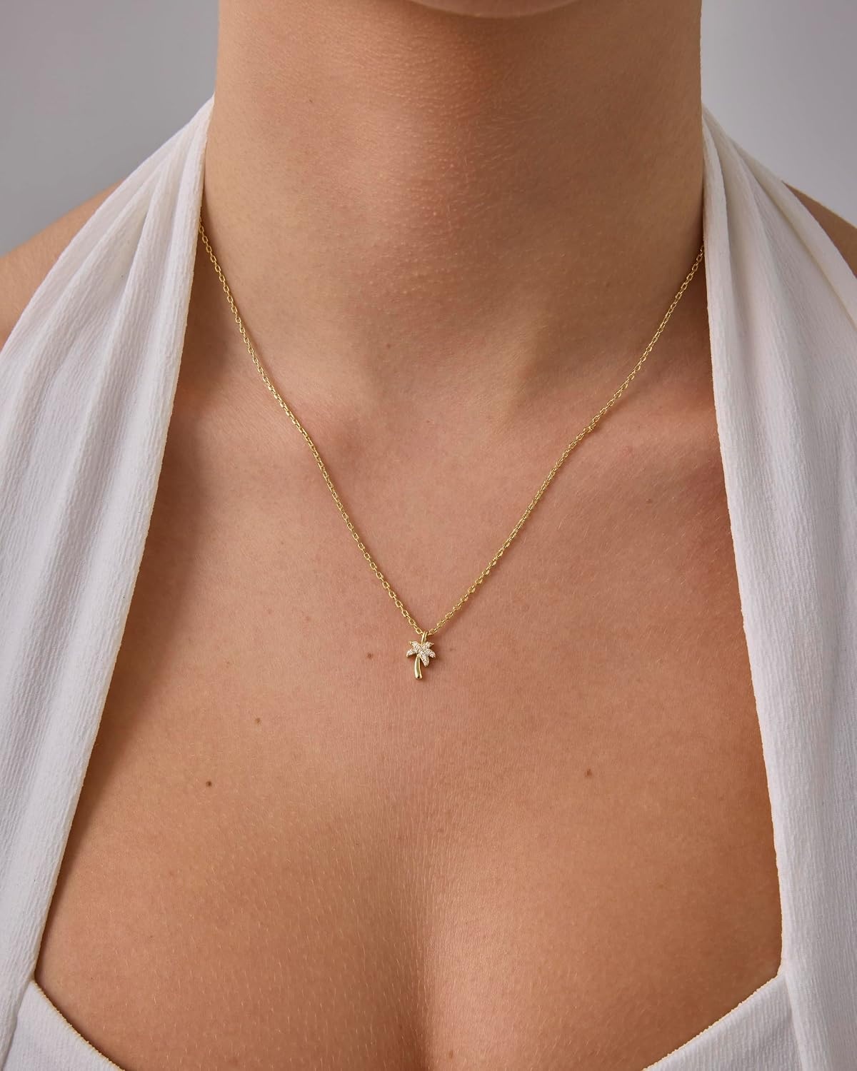 image:imagePAVOI 14K Gold Plated Dainty Cubic Zirconia Pendant Necklace for Women Dot Elephant Butterfly Pineapple Lock Knot Palm Tree Bow Smiley Pendant Layering Chain NecklacesYellow Gold