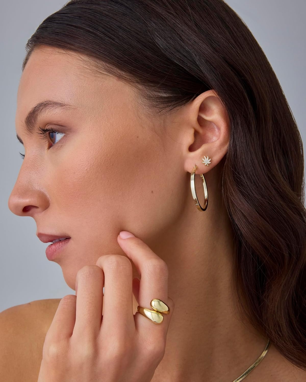 image:imagePAVOI 14K Gold Plated Dainty Flat Back Earrings for Women Hypoallergenic Sterling Silver Posts Helix Cartilage Piercing Jewelry Emoji Motif Bow Celestial Flatback Gold Stud Earrings Screw BackLeaf