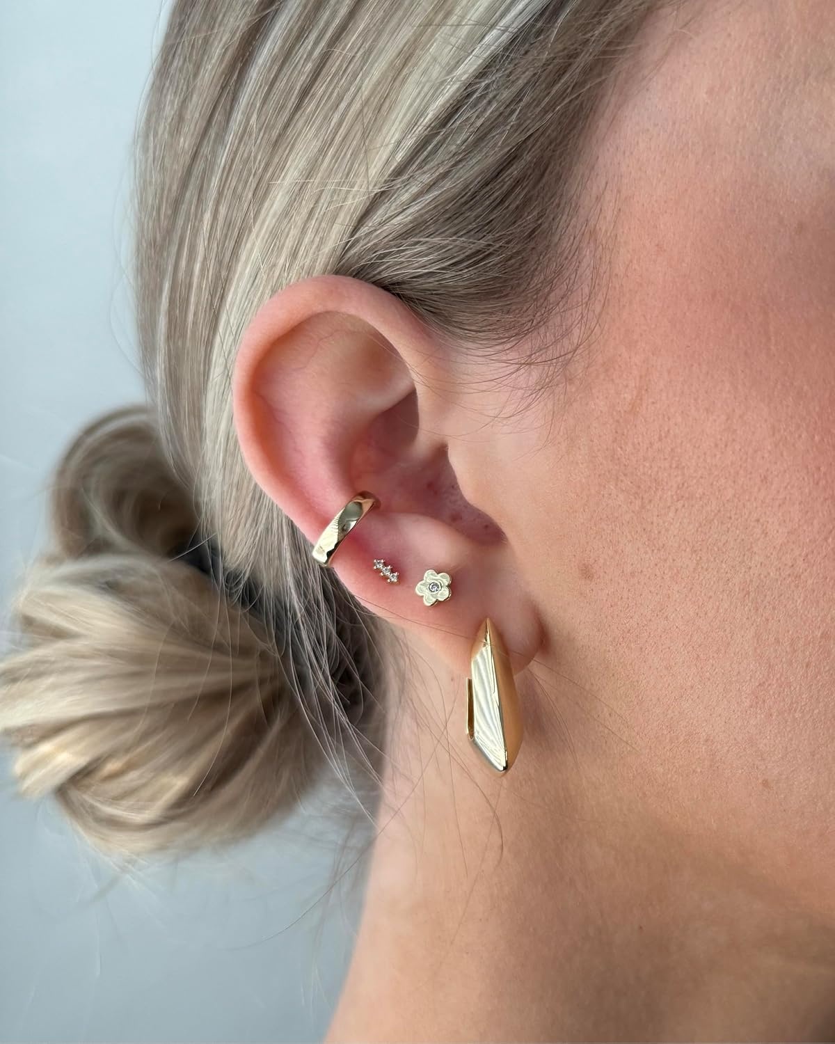 image:imagePAVOI 14K Gold Plated Dainty Flat Back Earrings for Women Hypoallergenic Sterling Silver Posts Helix Cartilage Piercing Jewelry Emoji Motif Bow Celestial Flatback Gold Stud Earrings Screw BackFlower