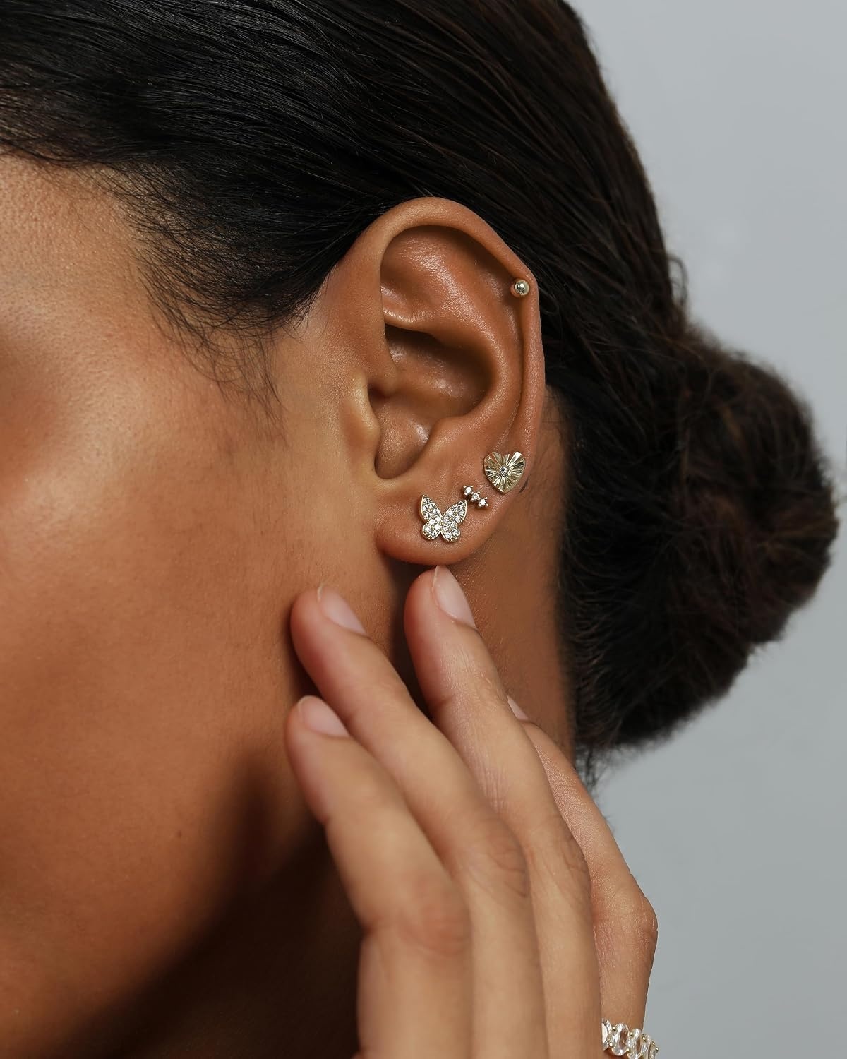 image:imagePAVOI 14K Gold Plated Dainty Flat Back Earrings for Women Hypoallergenic Sterling Silver Posts Helix Cartilage Piercing Jewelry Emoji Motif Bow Celestial Flatback Gold Stud Earrings Screw BackButterfly 4Pair Set