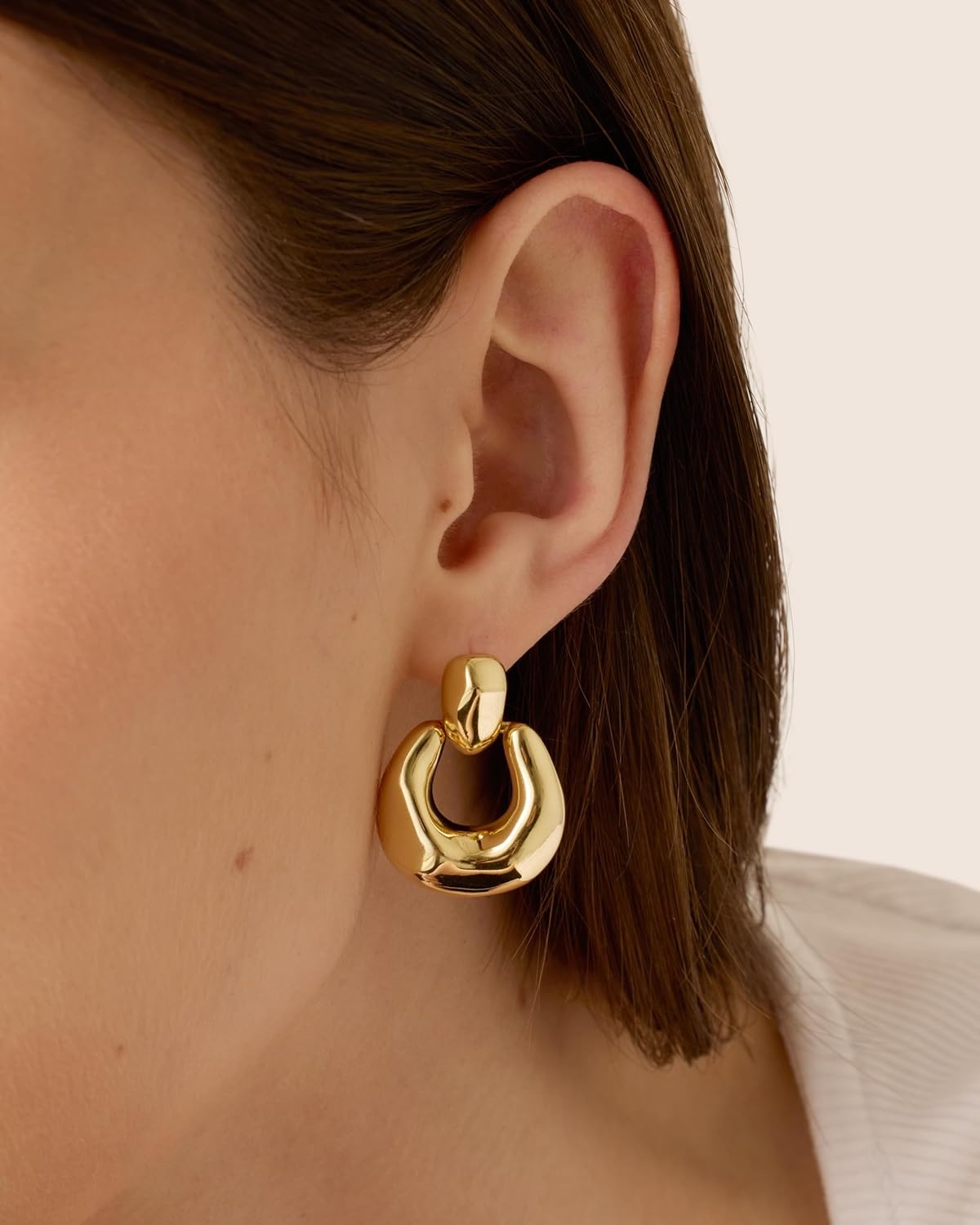 image:imagePAVOI 14K Gold Plated Door Knocker Statement Earrings for Women Chunky Gold Earrings for Women Trendy Mixed Metals Bold Knot Drop Dangle JewelryWhite Gold