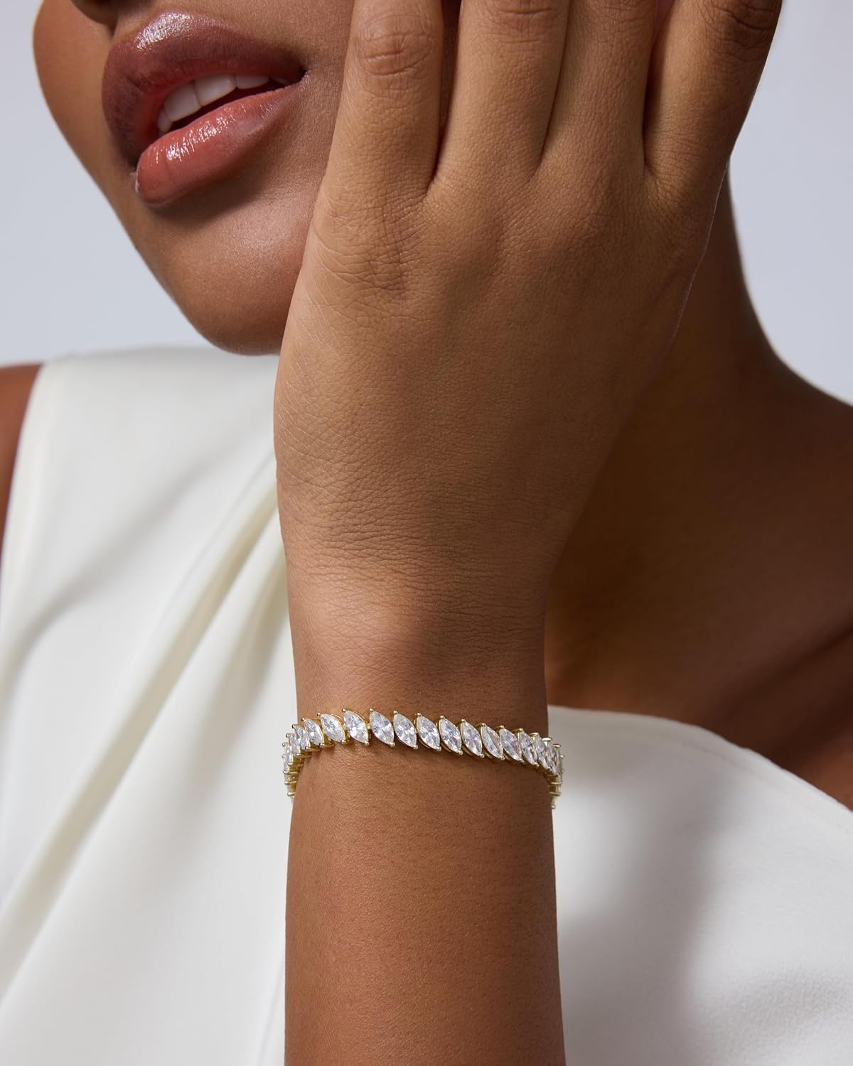 image:imagePAVOI 14K Gold Plated Marquise Cut Tennis Bracelet for Women Cubic Zirconia Gold Tennis Bracelets for Women Delicate Marquise CZ Bridal Jewelry for WeddingYellow Gold
