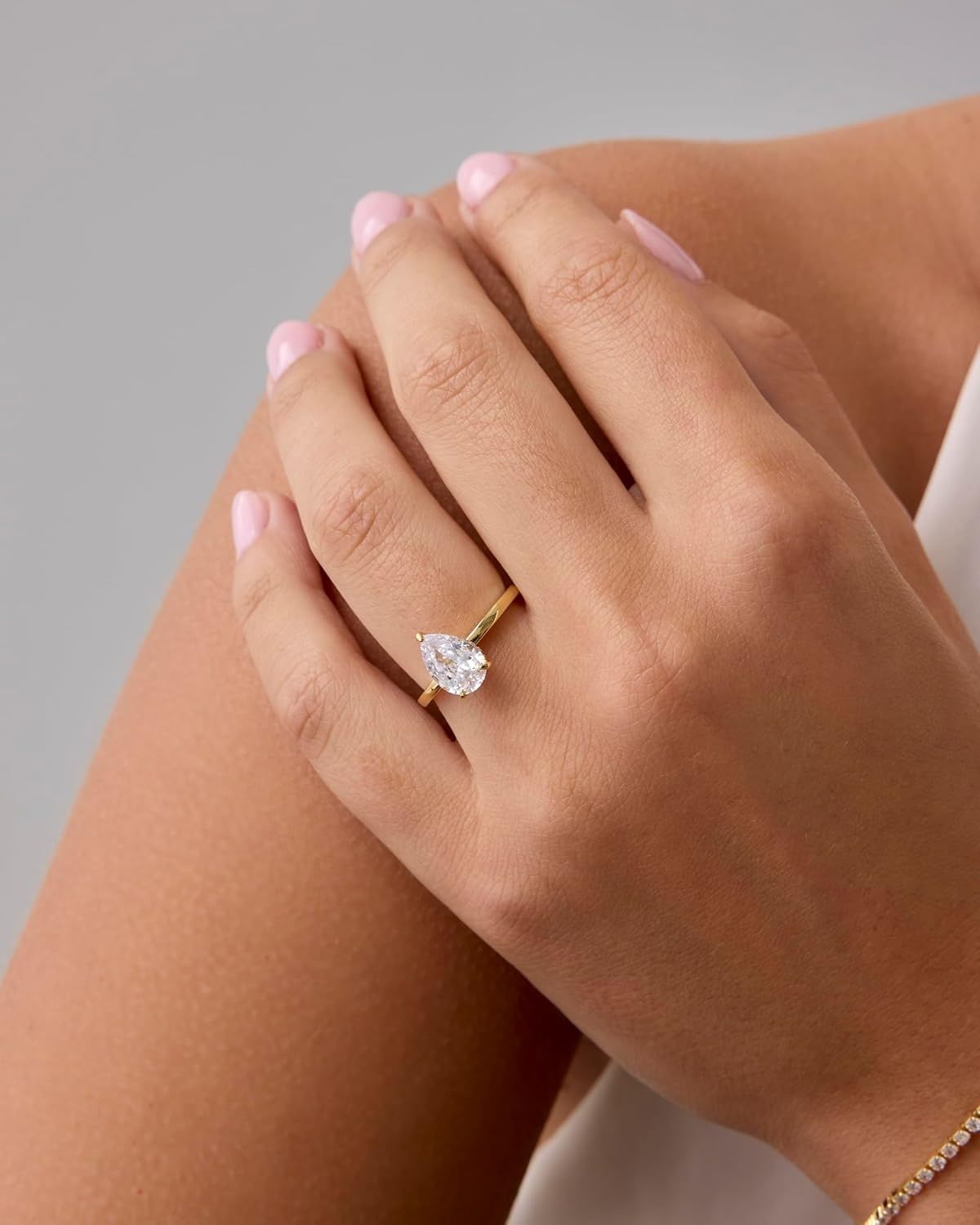 image:imagePAVOI 14K Gold Plated Simple 25CT Pear Cubic Zirconia Hidden Halo Eternity Ring Bridal Wedding Promise Statement Engagement Ring for WomenWhite Gold