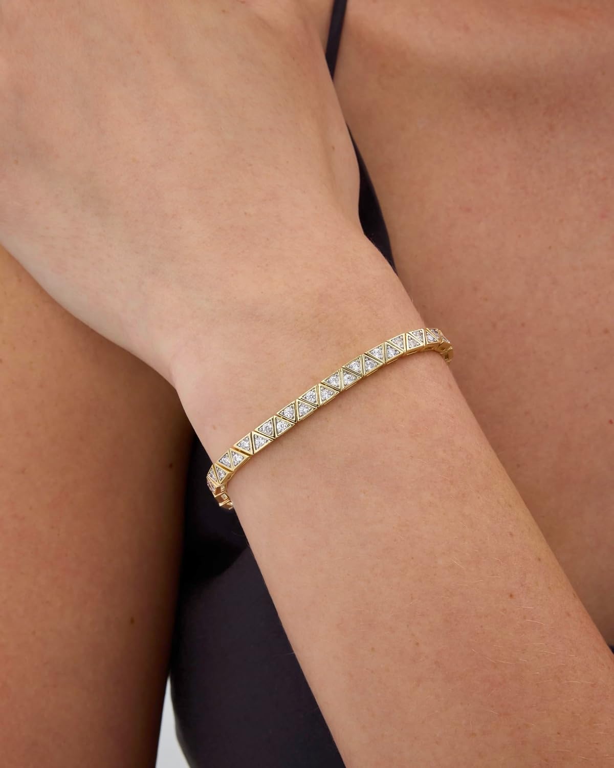 image:imagePAVOI 14K Gold Plated Tennis Bracelets for Women Bezel Set Cubic Zirconia Bracelet Simulated Diamonds Round Trillion Trinity Radiant Pear Valentines Day Heart Cut Stones Wedding Jewelry Gifts for BridesYellow Gold