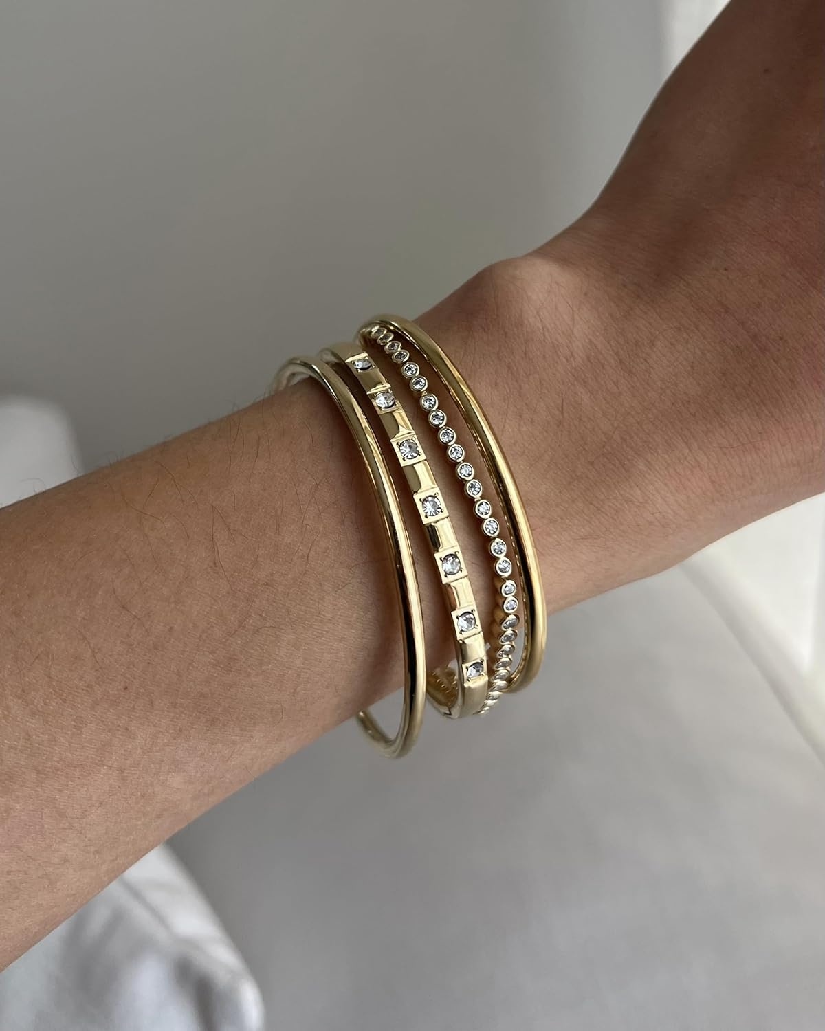 image:imagePAVOI 14K Gold Plated Tennis Bracelets for Women Bezel Set Cubic Zirconia Bracelet Simulated Diamonds Round Trillion Trinity Radiant Pear Valentines Day Heart Cut Stones Wedding Jewelry Gifts for BridesWhite Gold