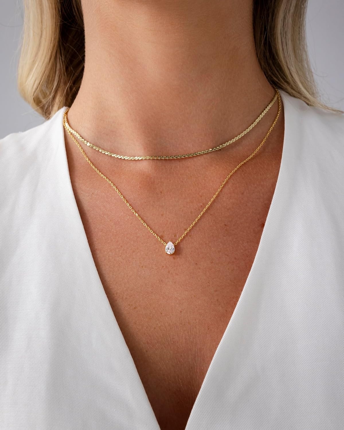 image:imagePAVOI 14K Gold Plated Twisted Singapore Chain Layering Choker with Round Solitaire and Serpentine Chain Layering Choker with PearCut Stone Pendant Necklace Pack for Women Cubic Zirconia Statement Layered Necklace SetYellow Gold