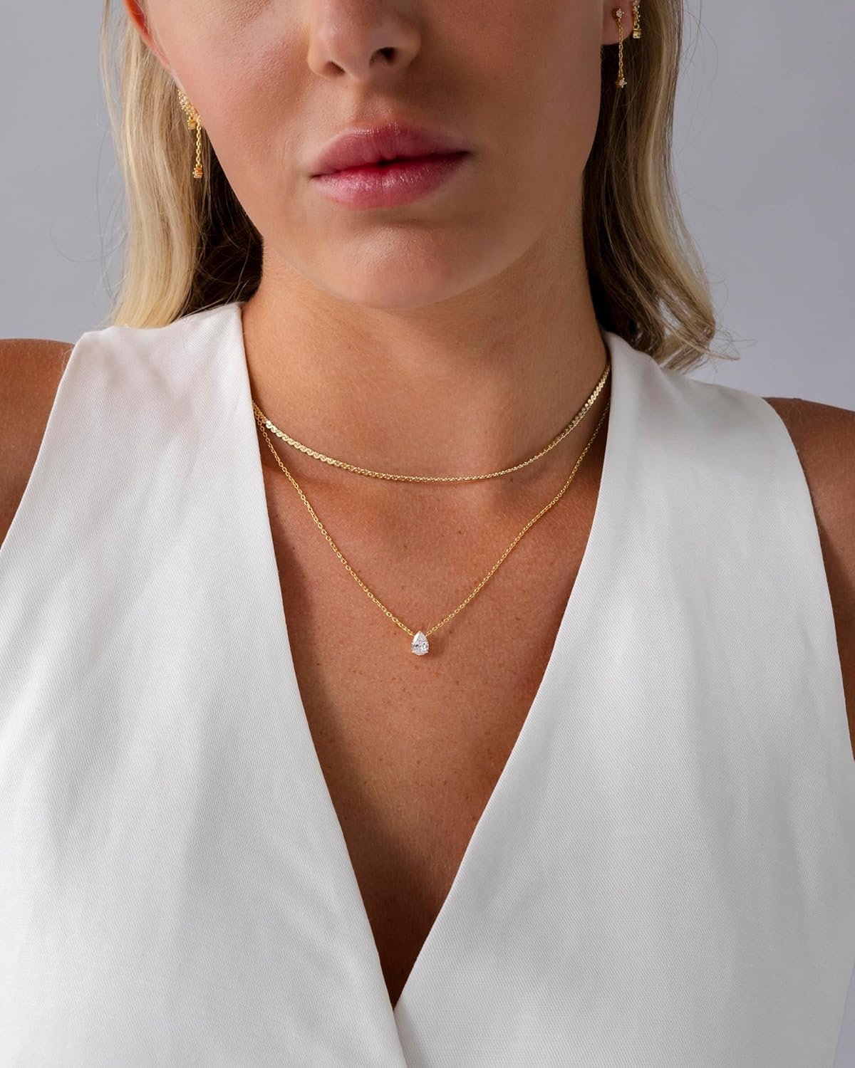 image:imagePAVOI 14K Gold Plated Twisted Singapore Chain Layering Choker with Round Solitaire and Serpentine Chain Layering Choker with PearCut Stone Pendant Necklace Pack for Women Cubic Zirconia Statement Layered Necklace SetYellow Gold