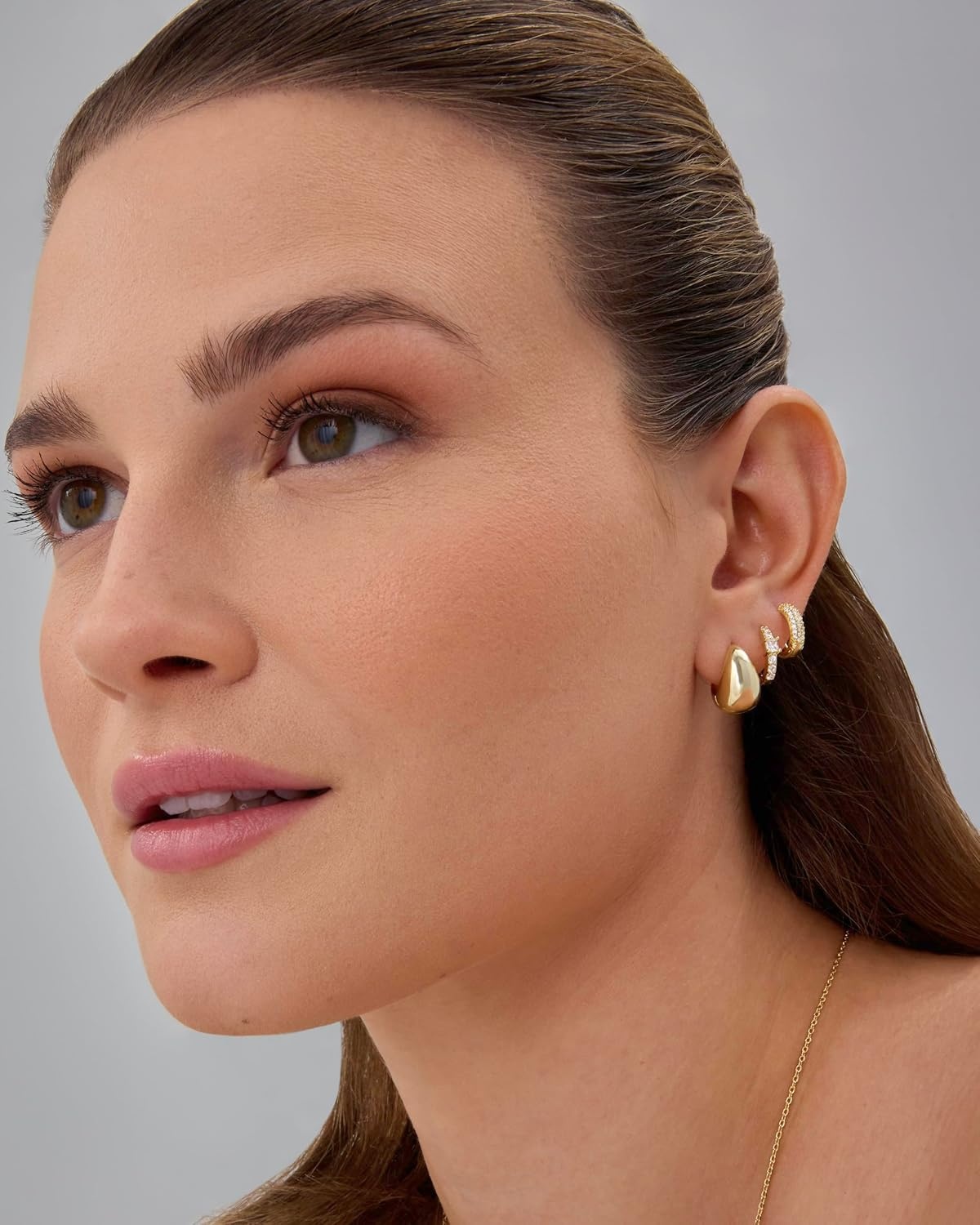 image:imagePAVOI 18K Gold Plated 925 Sterling Silver Posts Three Pairs Huggie Hoop Earrings for Women Triple Gold Hoop Earring Pack with Cubic Zirconia Hypoallergenic Chunky Dome Pave Huggie Piercing Statement Jewelry SetYellow Gold