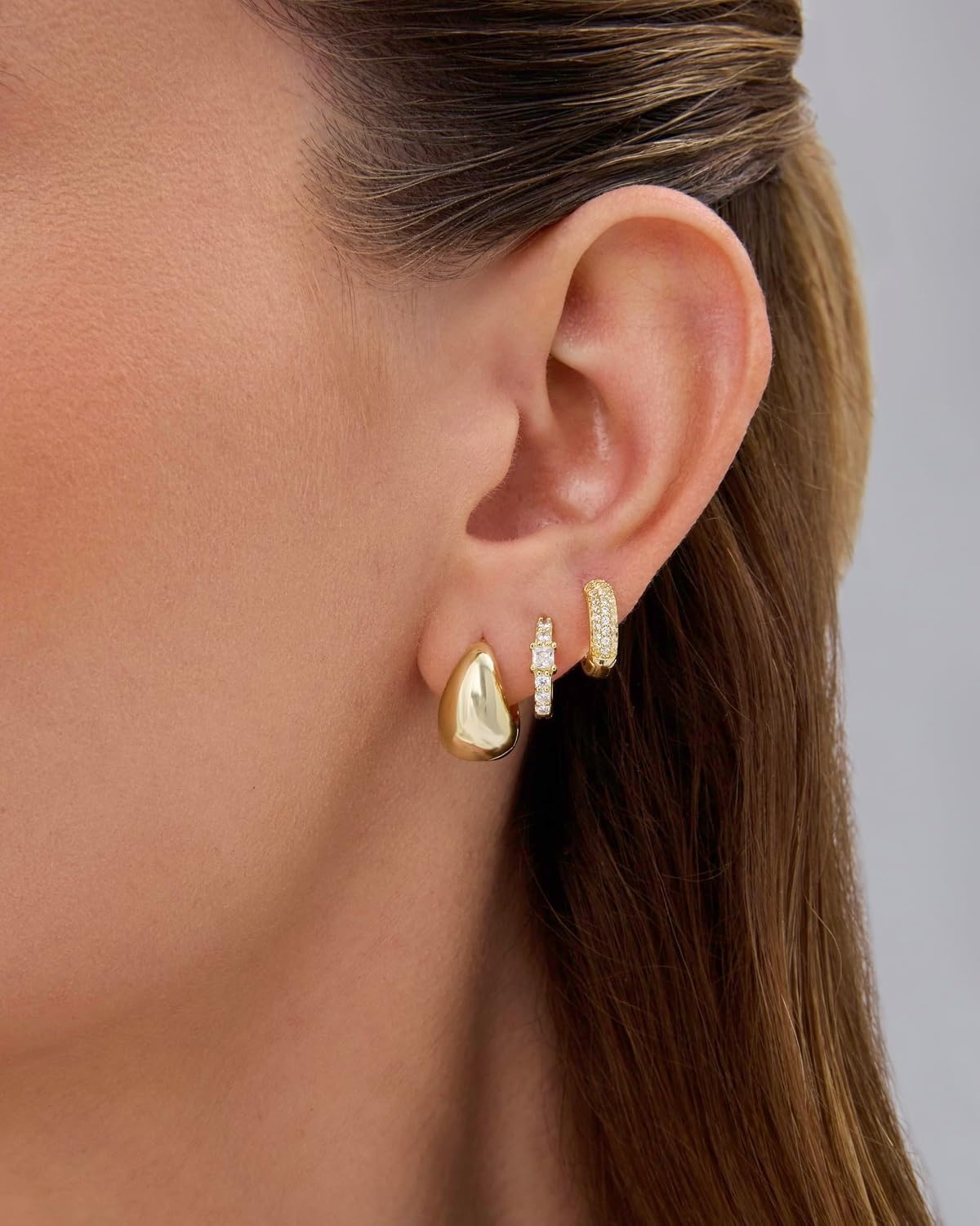 image:imagePAVOI 18K Gold Plated 925 Sterling Silver Posts Three Pairs Huggie Hoop Earrings for Women Triple Gold Hoop Earring Pack with Cubic Zirconia Hypoallergenic Chunky Dome Pave Huggie Piercing Statement Jewelry SetYellow Gold