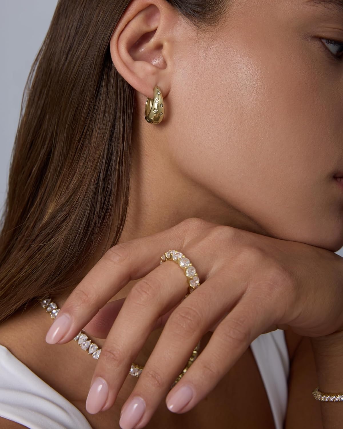 image:imagePAVOI Waterproof Gold Hoop Earrings for Women 14K Gold Plated Chunky Huggie Hoop Earrings with Cubic Zirconia Starburst Stainless Steel Trendy Summer Fashion JewelryWhite Gold