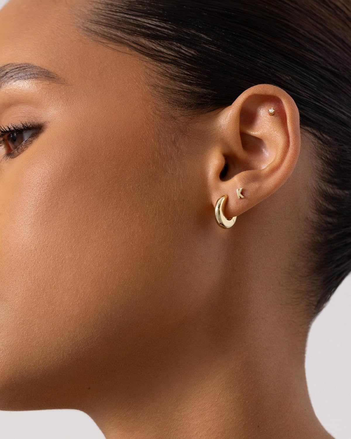 image:imagePAVOI 14K Gold Plated Initial Flat Back Earrings for Women Cubic Zirconia Dainty Initial Letter Jewelry Gifts 925 Sterling Silver Posts Cartilage Piercing Flatback Gold Stud Earrings Screw BackYellow Gold