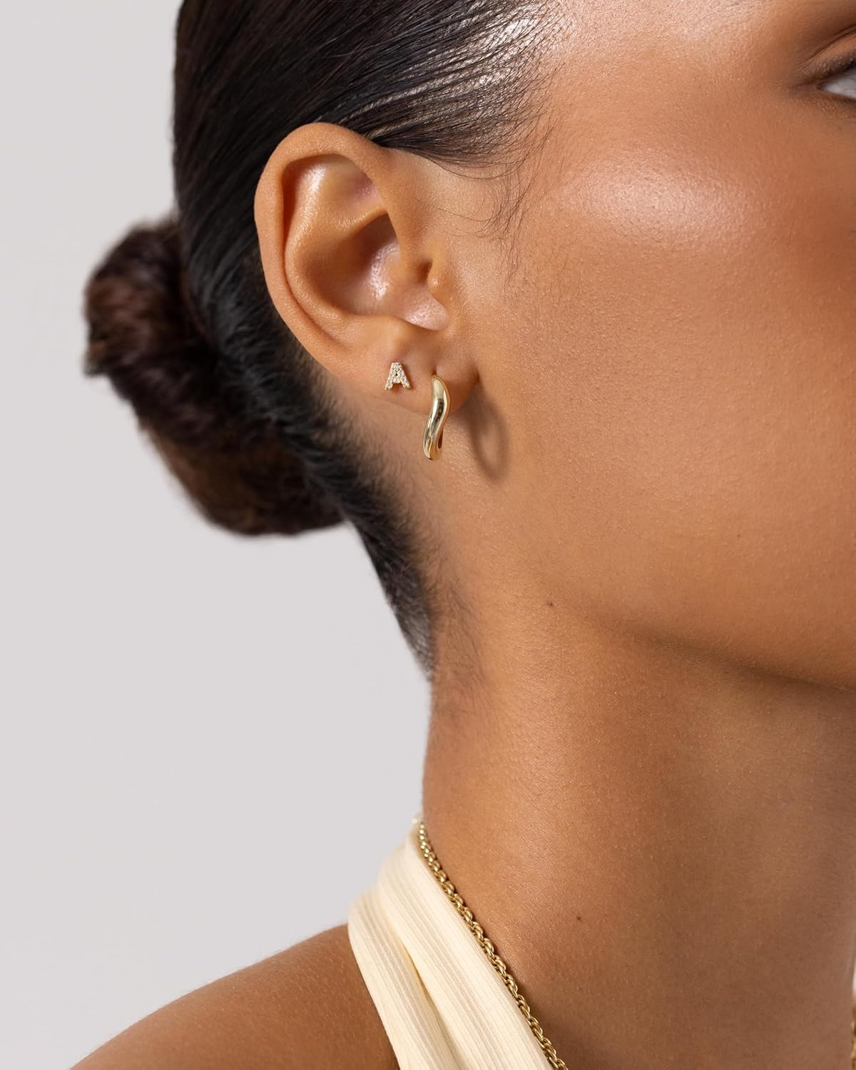 image:imagePAVOI 14K Gold Plated Initial Flat Back Earrings for Women Cubic Zirconia Dainty Initial Letter Jewelry Gifts 925 Sterling Silver Posts Cartilage Piercing Flatback Gold Stud Earrings Screw BackYellow Gold
