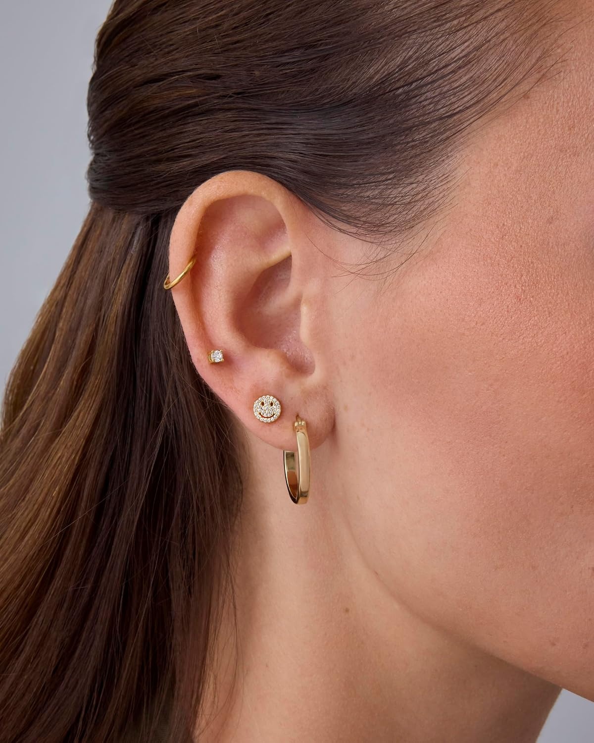 image:imagePAVOI 14K Gold Plated Titanium Clicker Hoop Earrings for Women Men Hinged Huggie Earring Cartilage Helix Nose Ring Tragus Rook Septum Piercing Jewelry 161820 GaugesYellow Gold