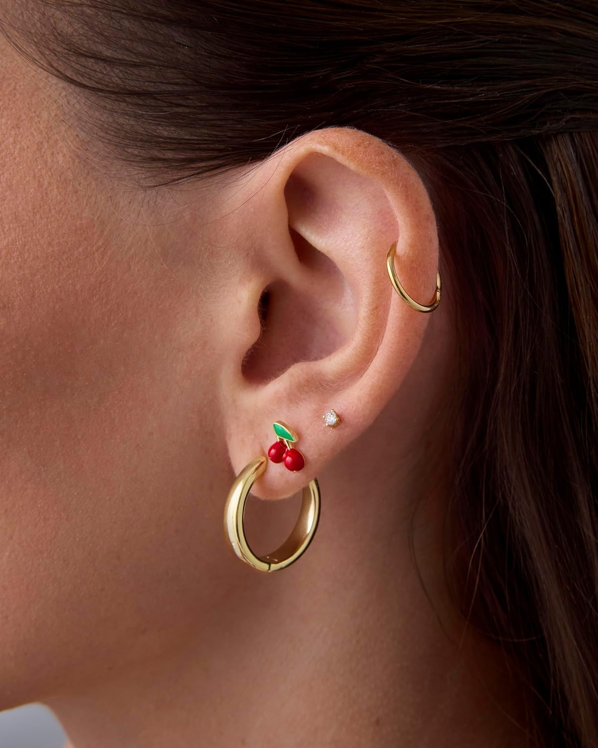 image:imagePAVOI 14K Gold Plated Titanium Clicker Hoop Earrings for Women Men Hinged Huggie Earring Cartilage Helix Nose Ring Tragus Rook Septum Piercing Jewelry 161820 GaugesYellow Gold