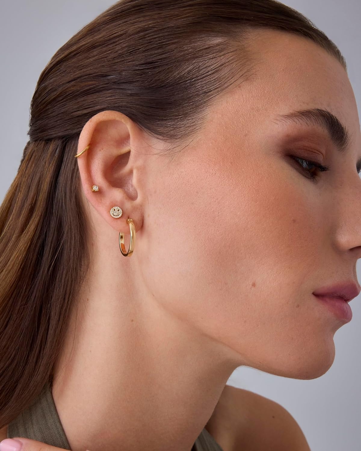 image:imagePAVOI 14K Gold Plated Titanium Clicker Hoop Earrings for Women Men Hinged Huggie Earring Cartilage Helix Nose Ring Tragus Rook Septum Piercing Jewelry 161820 GaugesYellow Gold